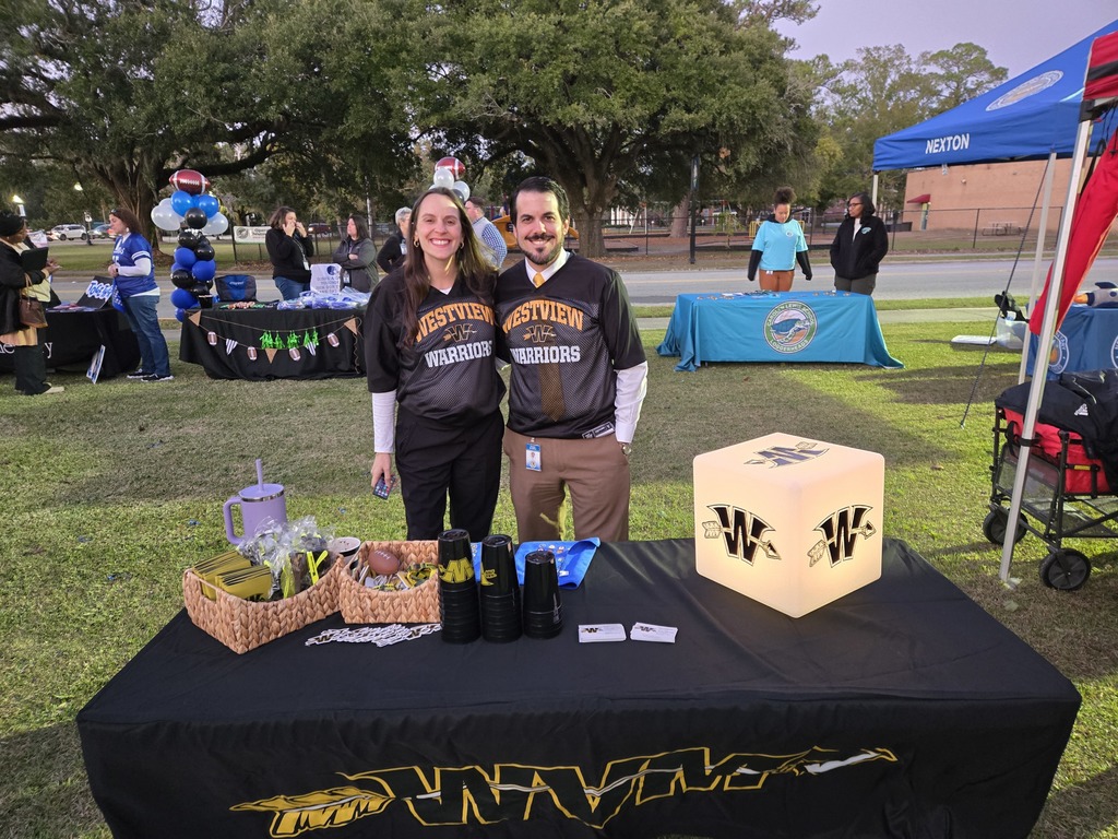 Principal and AP at a recruitment event
