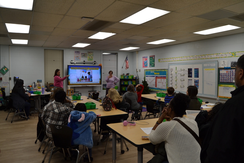HHA 2nd grade teachers teaching families about math strategies 