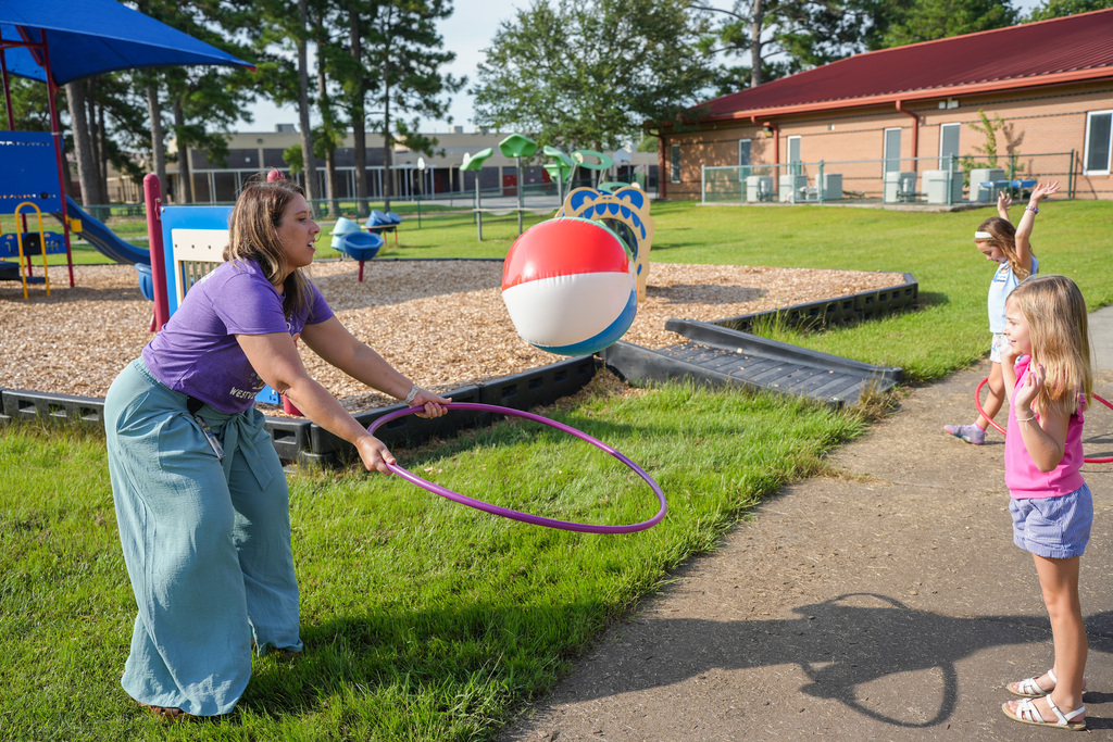 melcher playing with kids