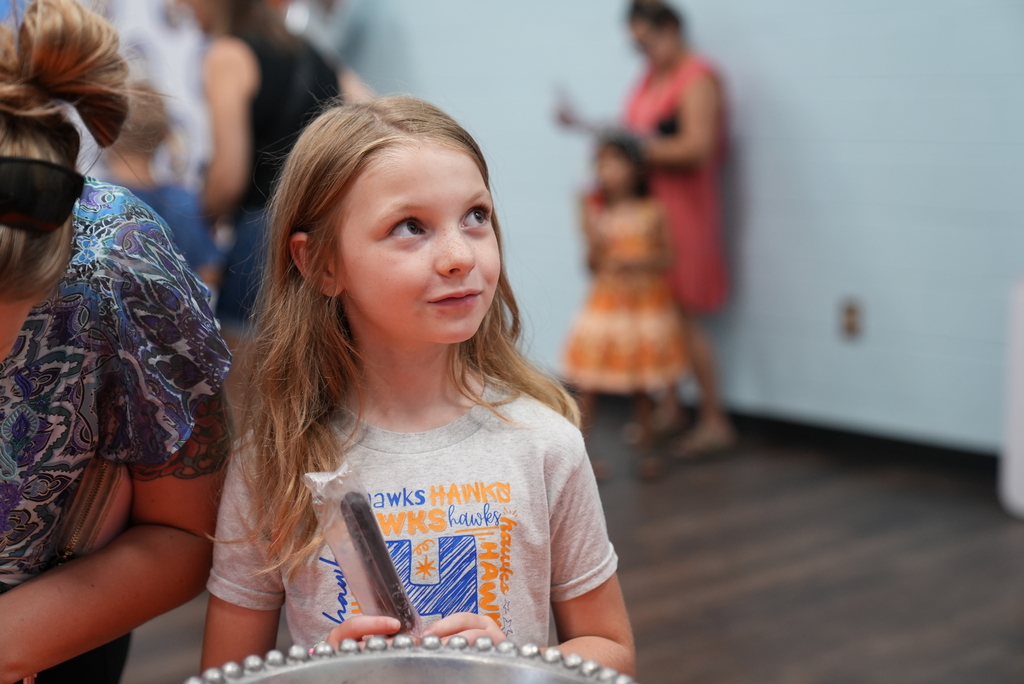 student with popsicle