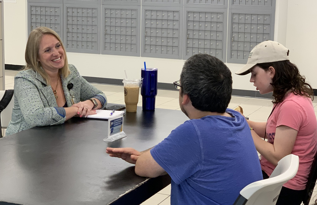 Dr. Canfield meeting with parent and student