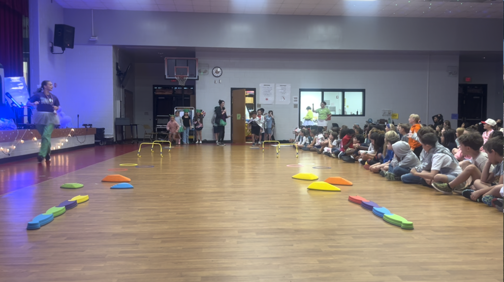 Image of students lined up to participate in an obstacle course! 