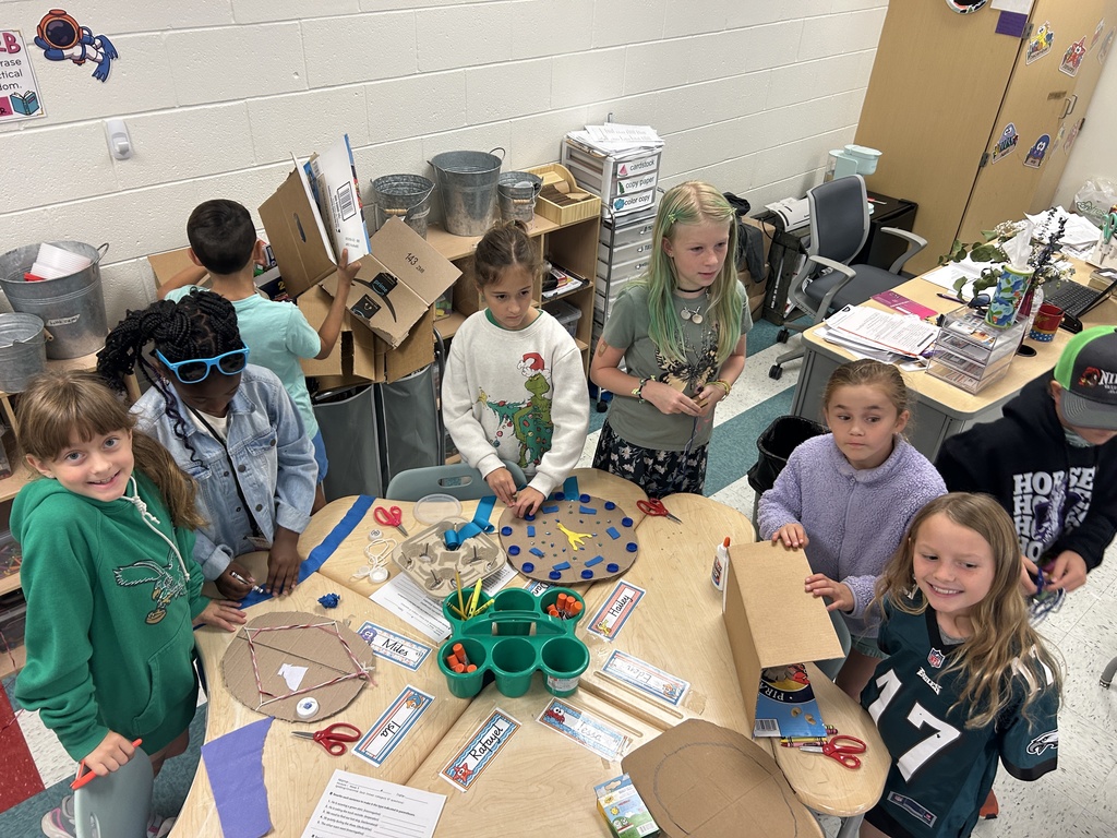 Students put creative touches on their shields.