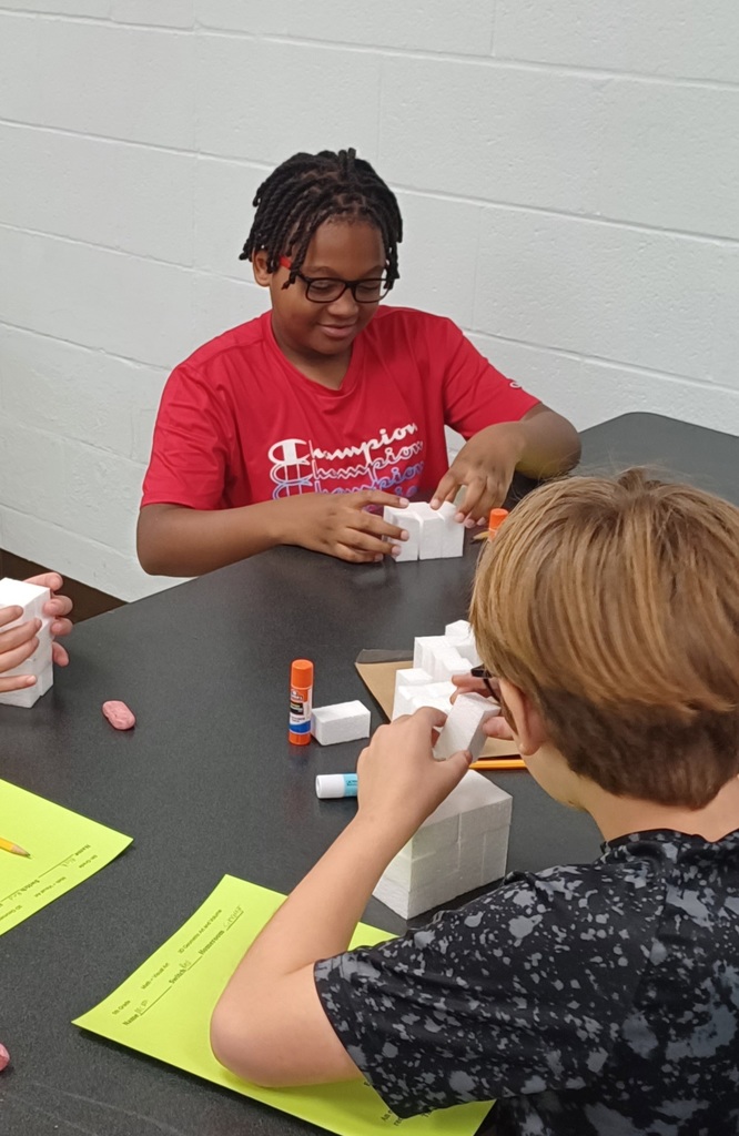 Two students working during an art infusion lesson