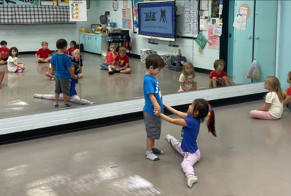 Two students working together during dance infusion