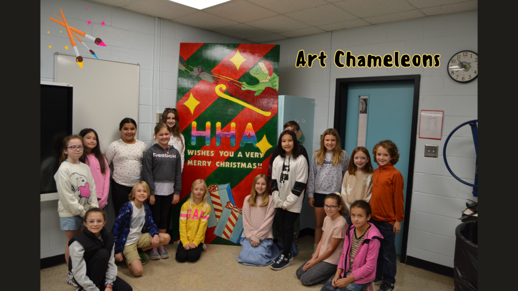 Art Chameleons in front of their Holiday Card