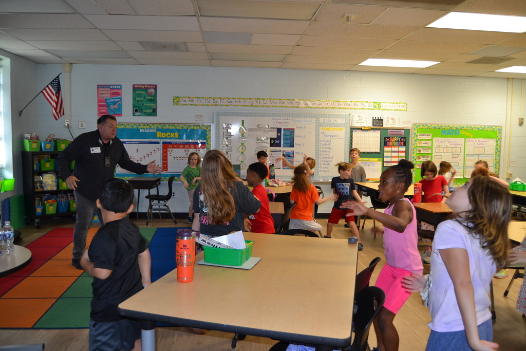 Students acting with an artist in residence