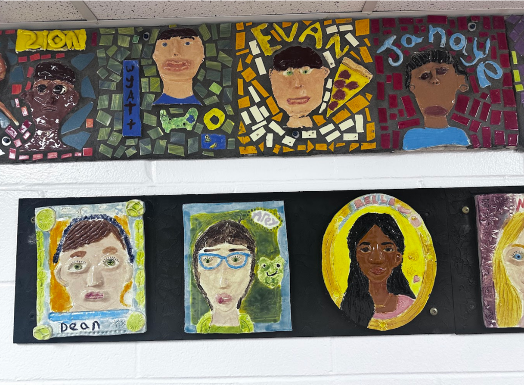 Clay portraits on the wall 