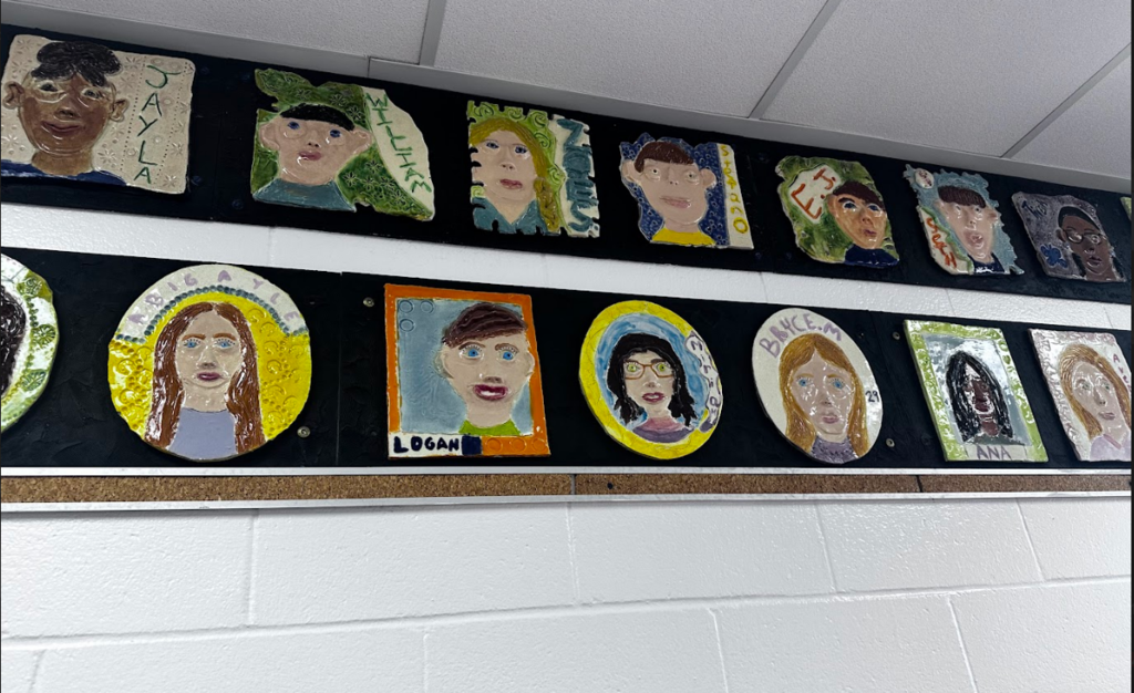 Clay portaits on the wall