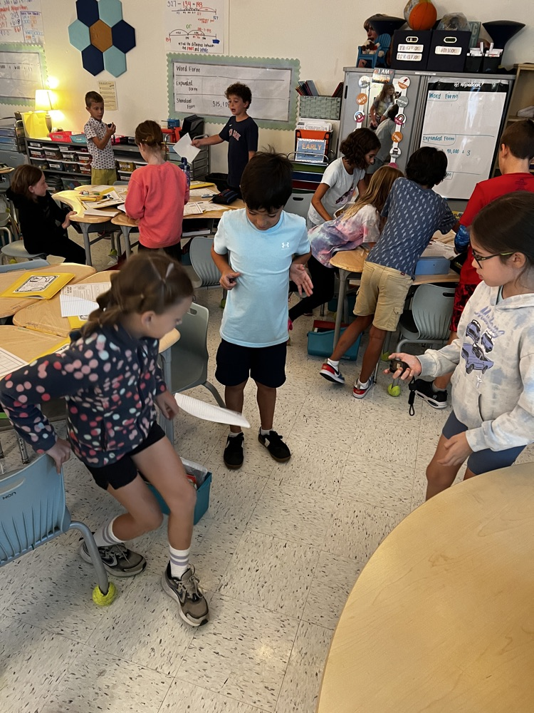 students experimenting with forces and motion 