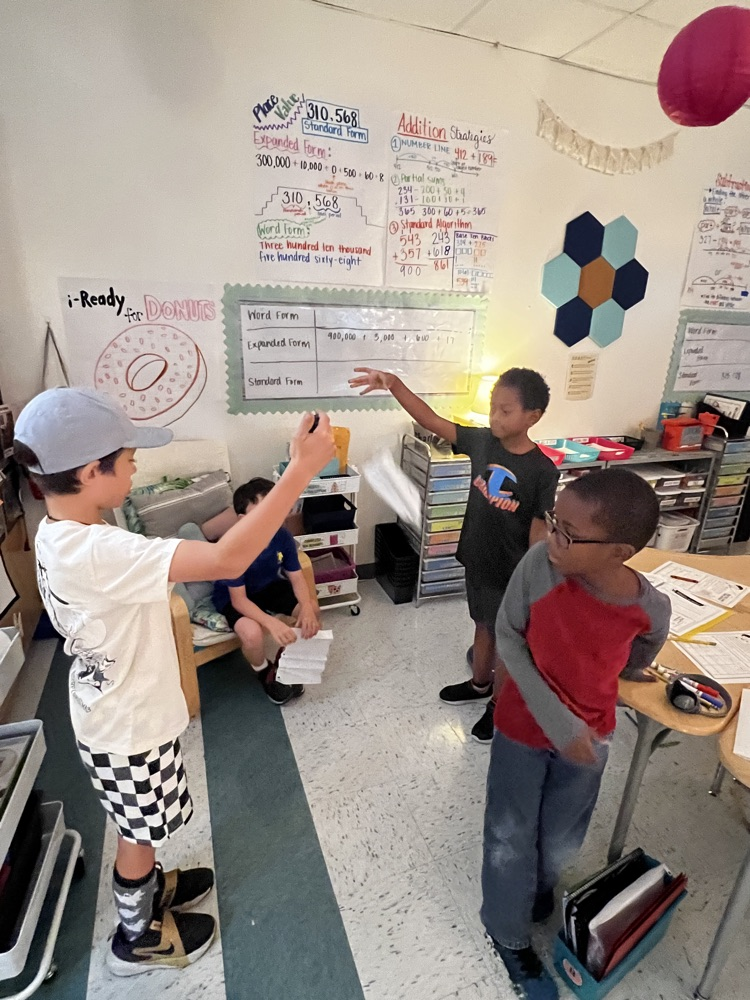 students experimenting with forces and motion 