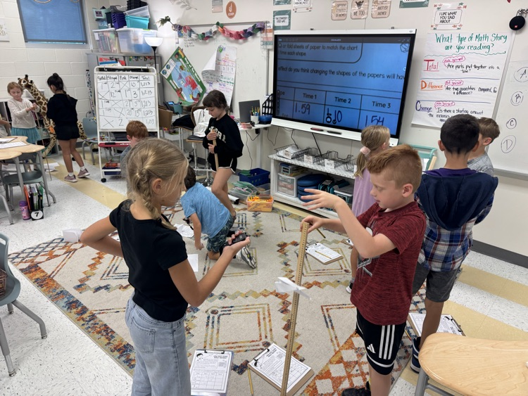 students experimenting with forces and motion 