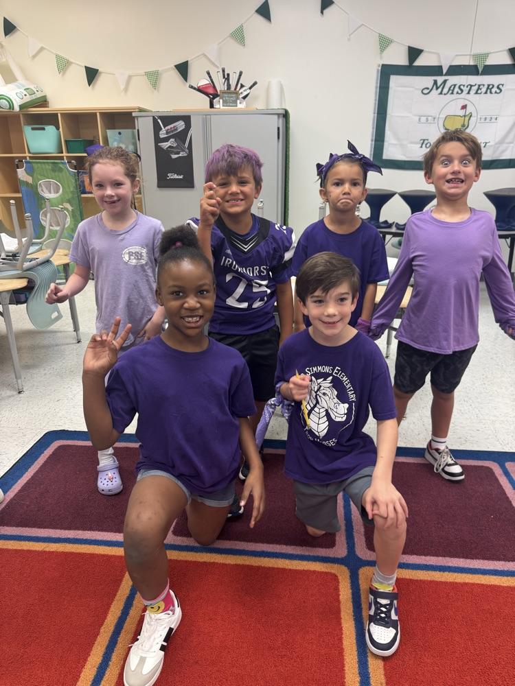 kids posing in purple clothes 