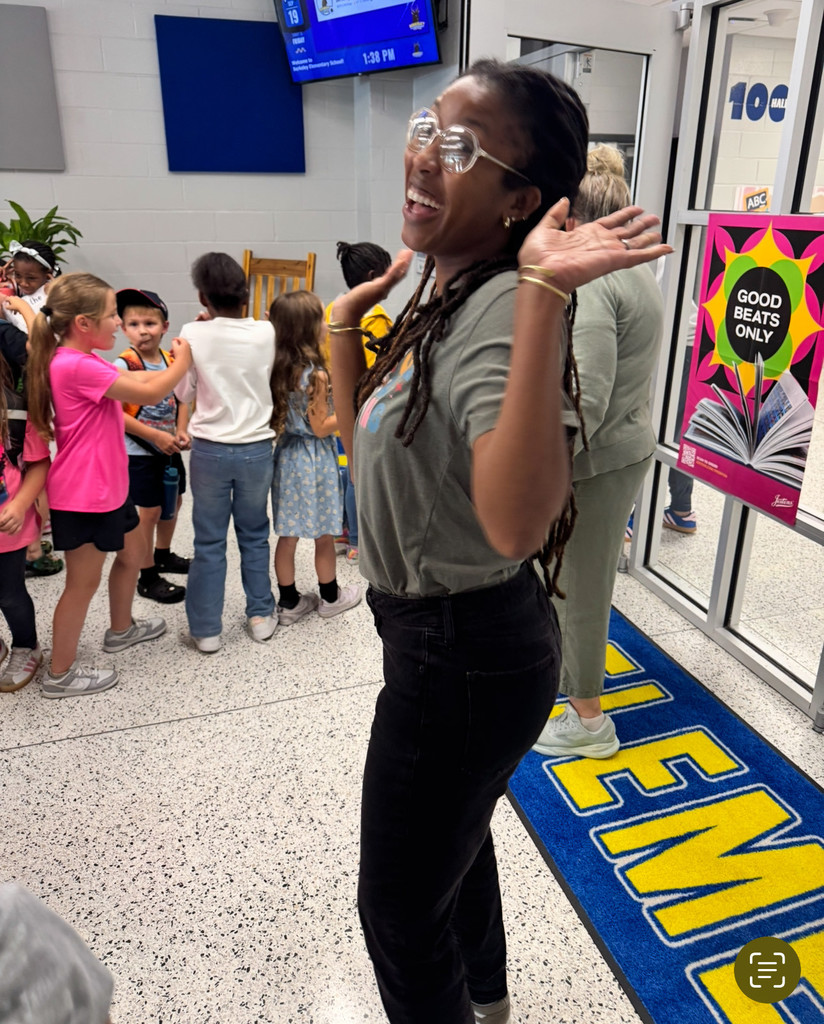 Ms. Martin is all smiles too!
