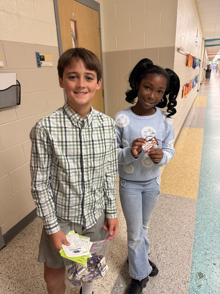 ren squad member giving a ren reward to student 