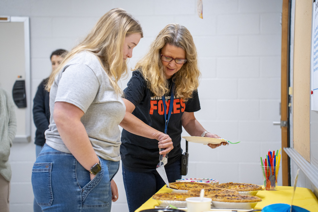 teachers slicing quiches
