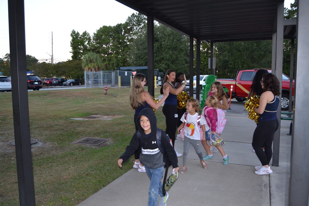 High fives and smiles