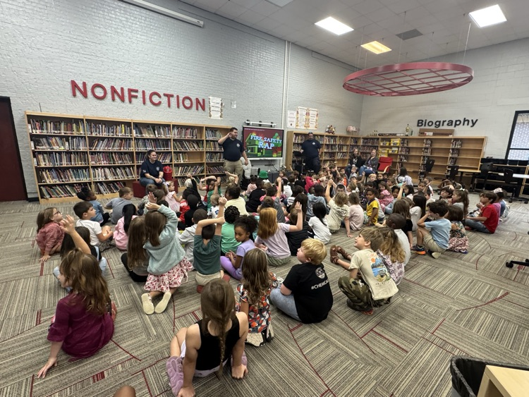 Students gathered in our library to listen to lessons on fire safety.