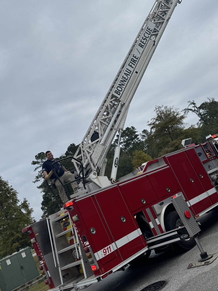 Fire truck with the extension ladder is pictured