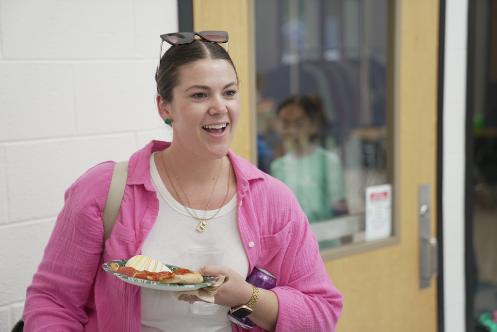 teacher with pizza