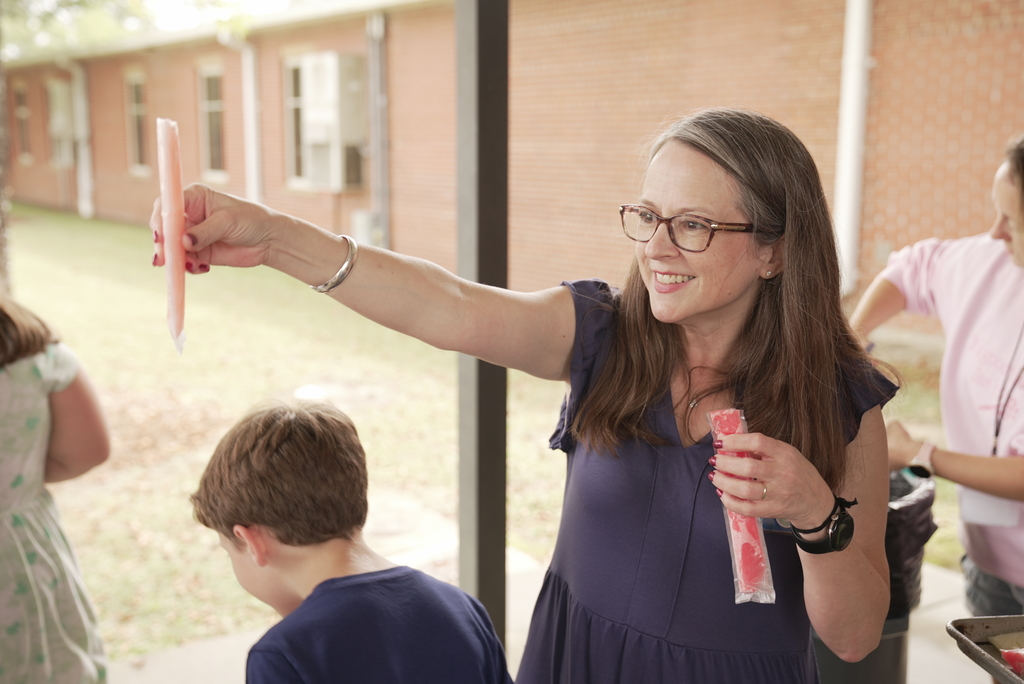 principal handing out popsicles