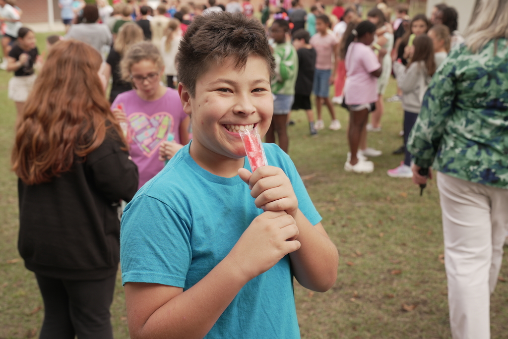 student with popsicle