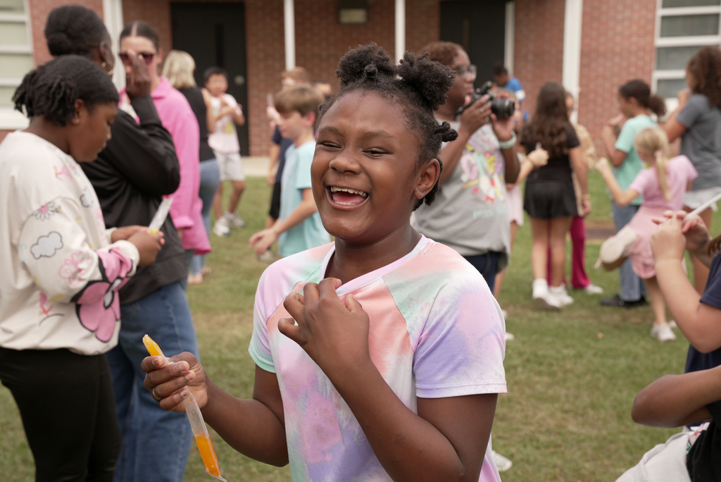 student with popsicle