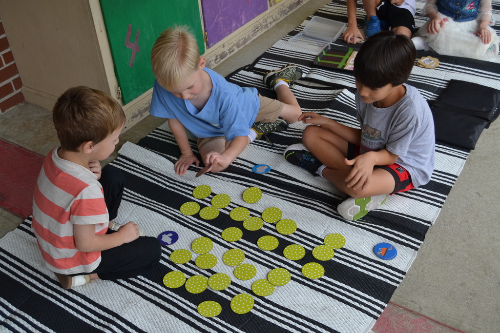 Kids playing a matching game.