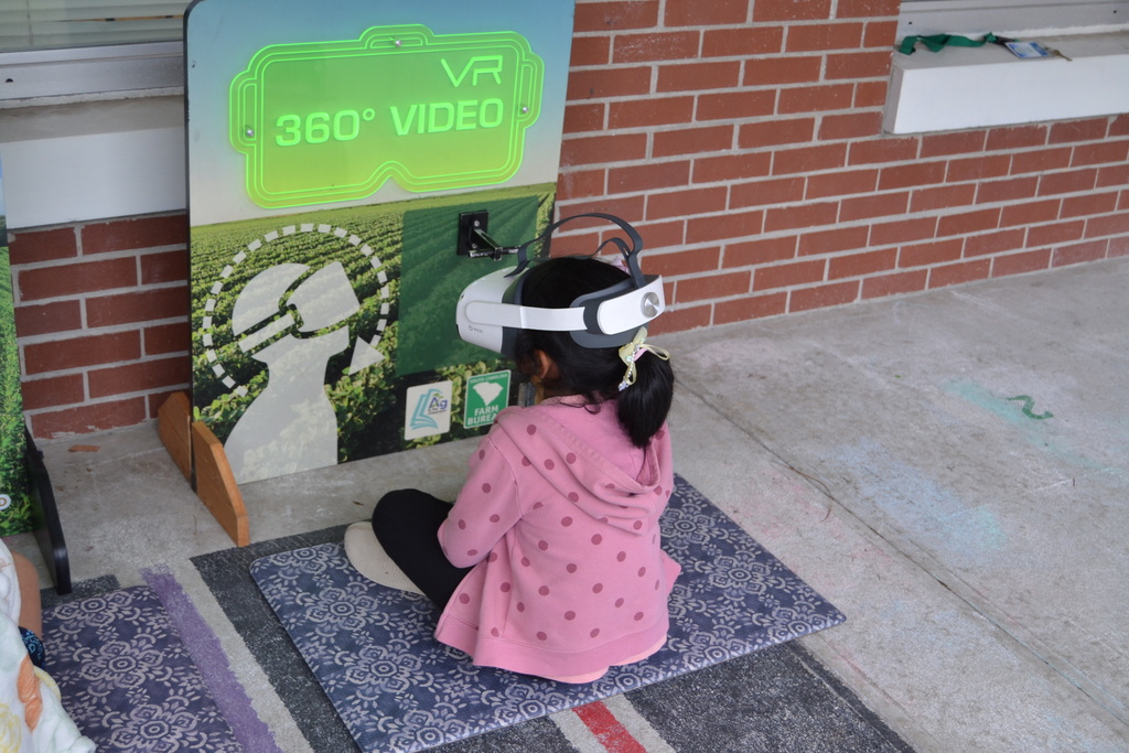 Kid looking at virtual reality program.