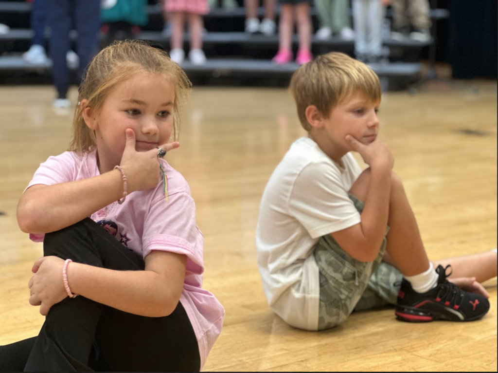 Students posing in a dance