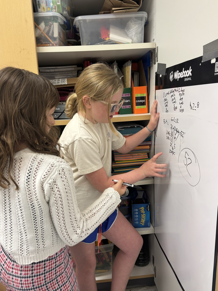 students working together on math problem 