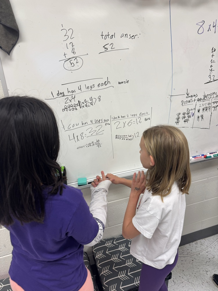 students working together on math problem 