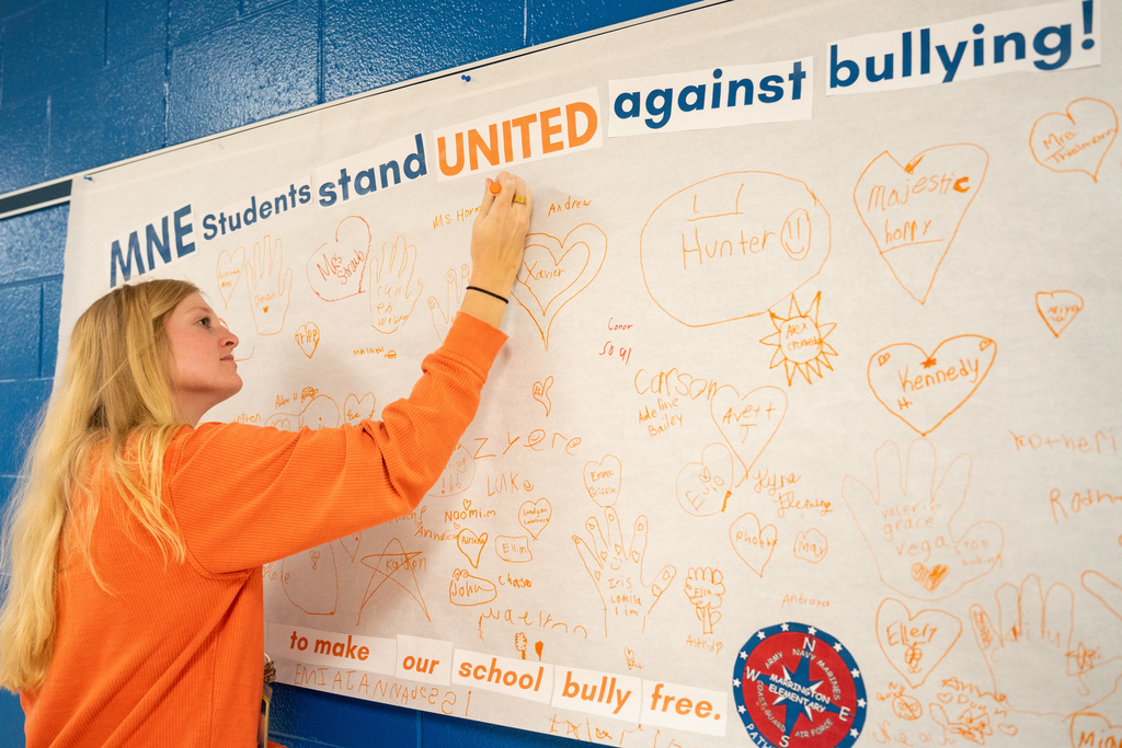 teacher signing banner