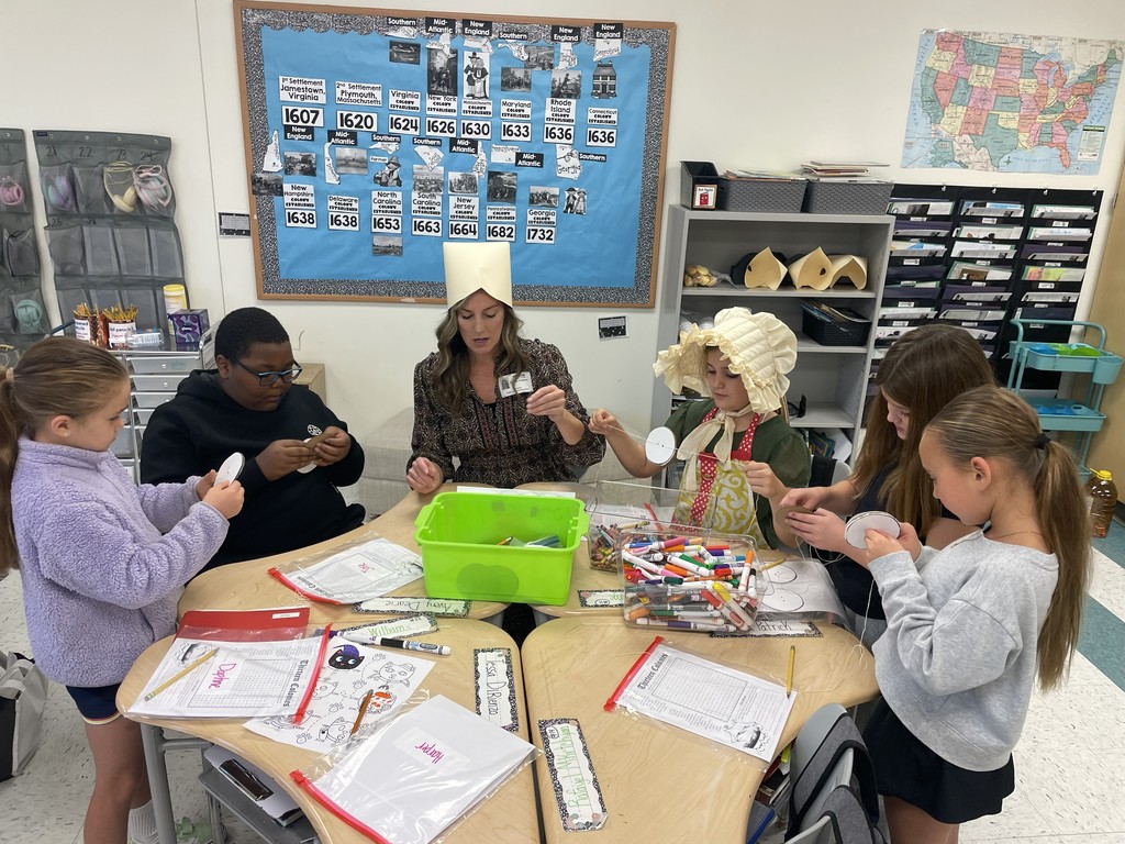 The students loved playing with this Colonial toy.