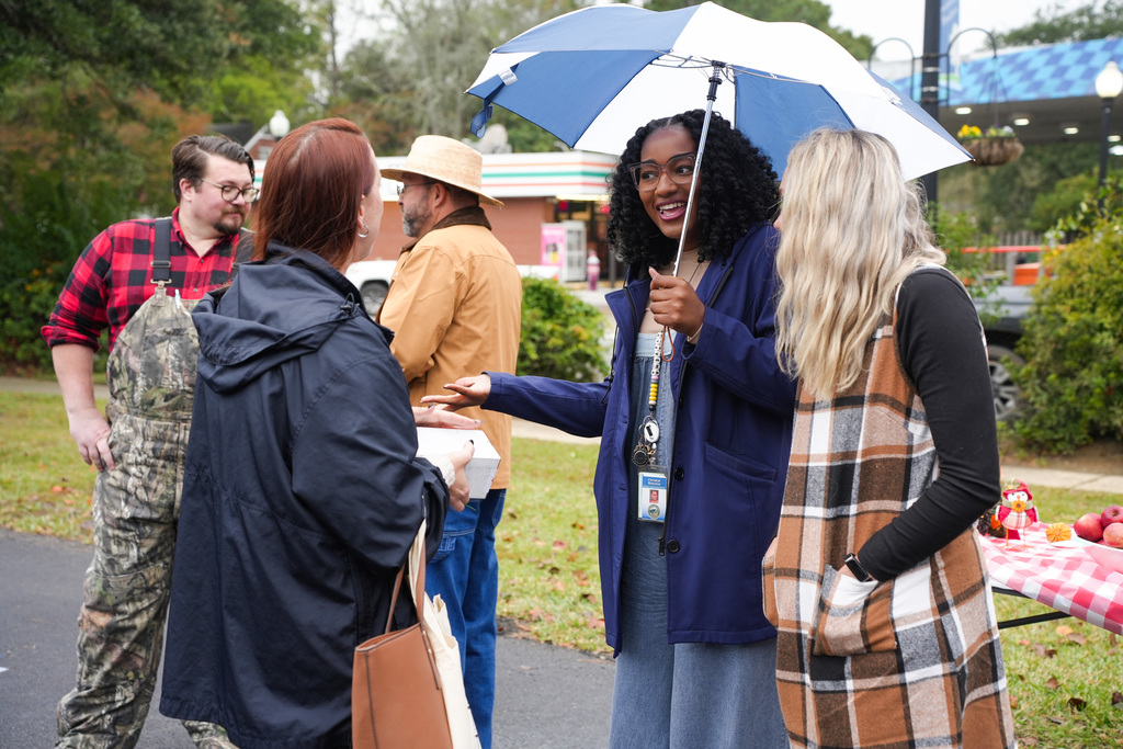 CLS staff with applicant