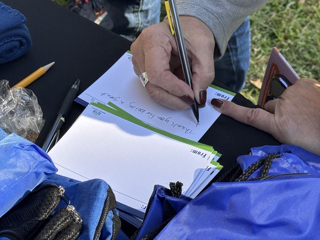 mom writing thank you letter