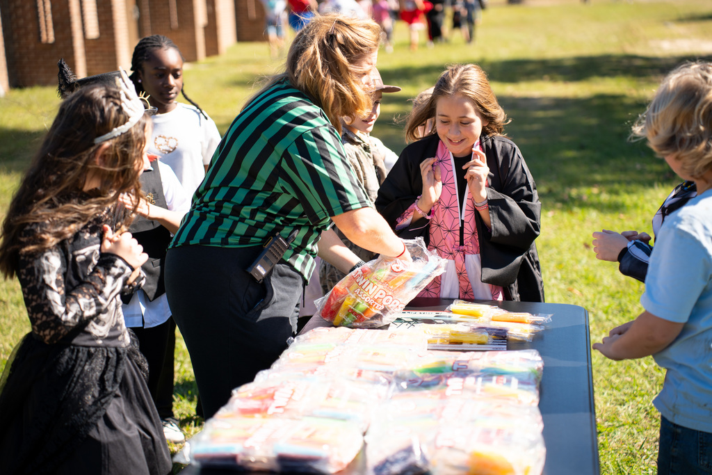 teachers handing out posicle