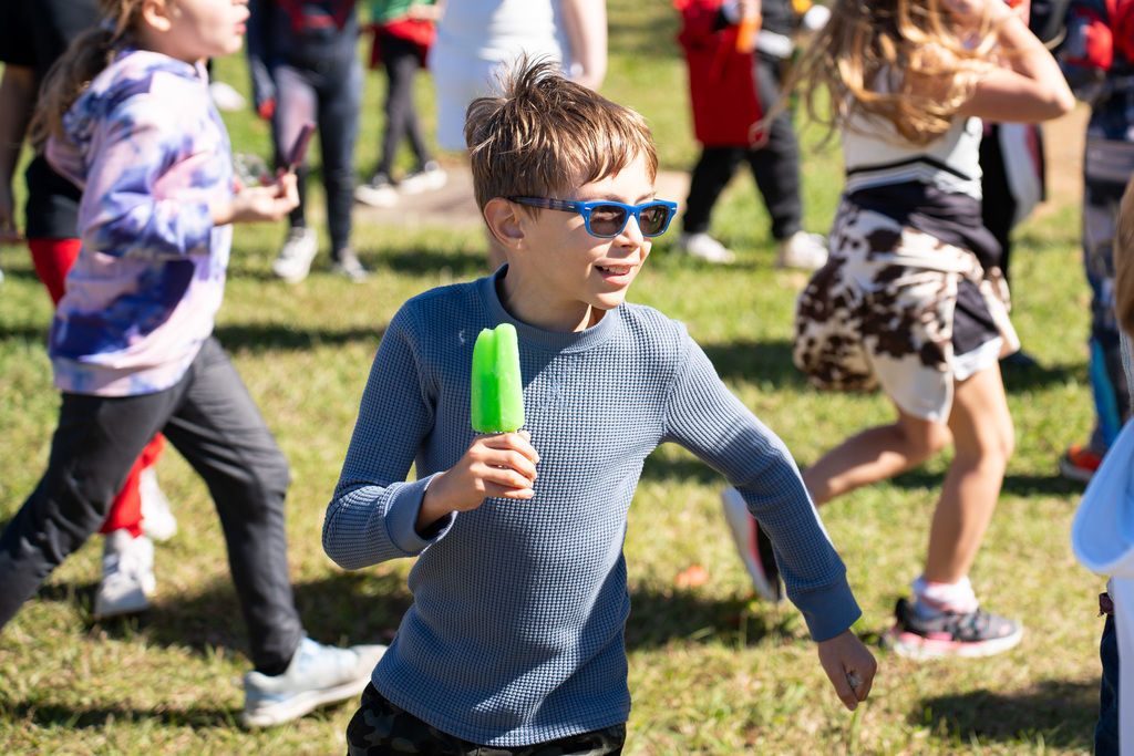 student with popsicle