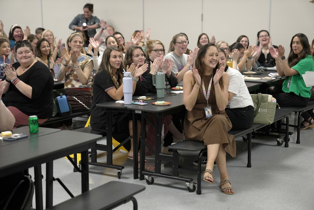 teachers clapping
