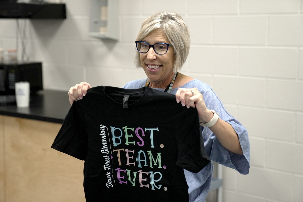 Principal with "Best. Team. Ever." t-shirt