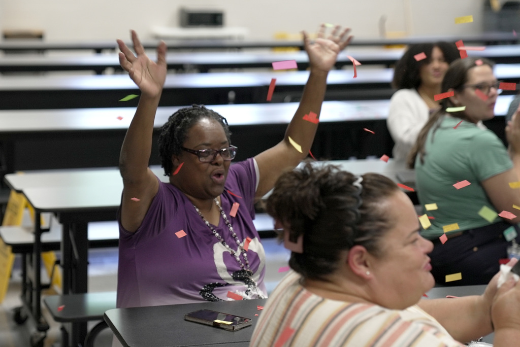 teacher throwing confetti