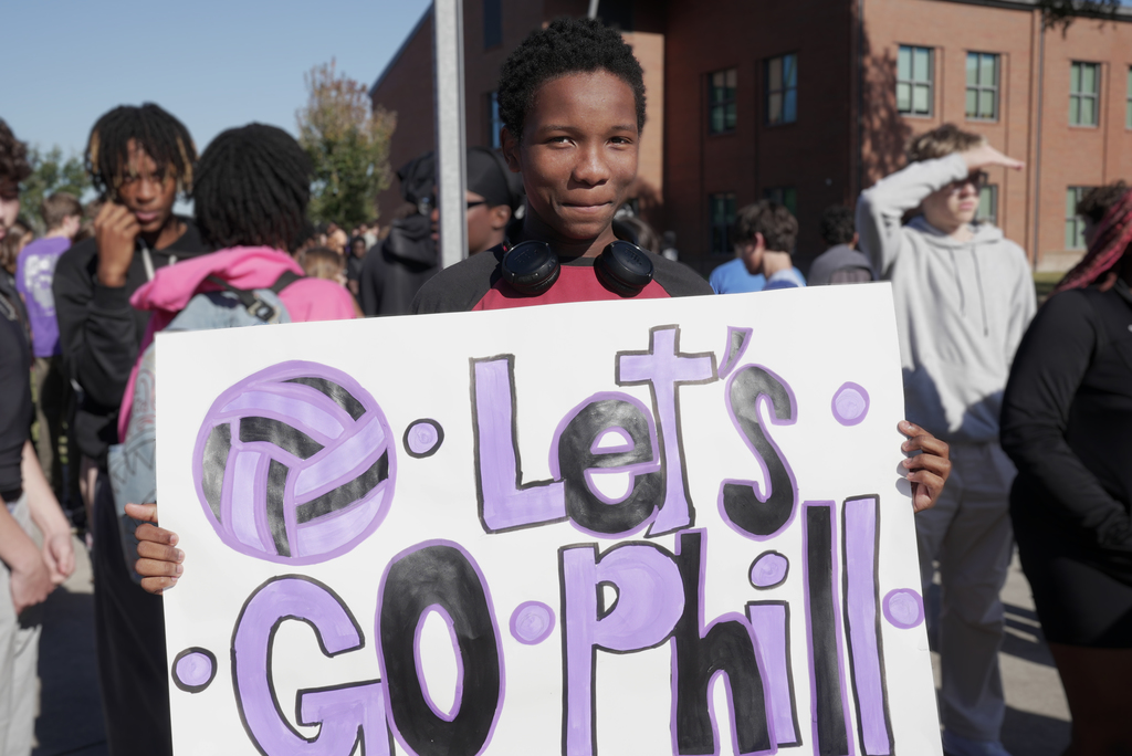 students with poster