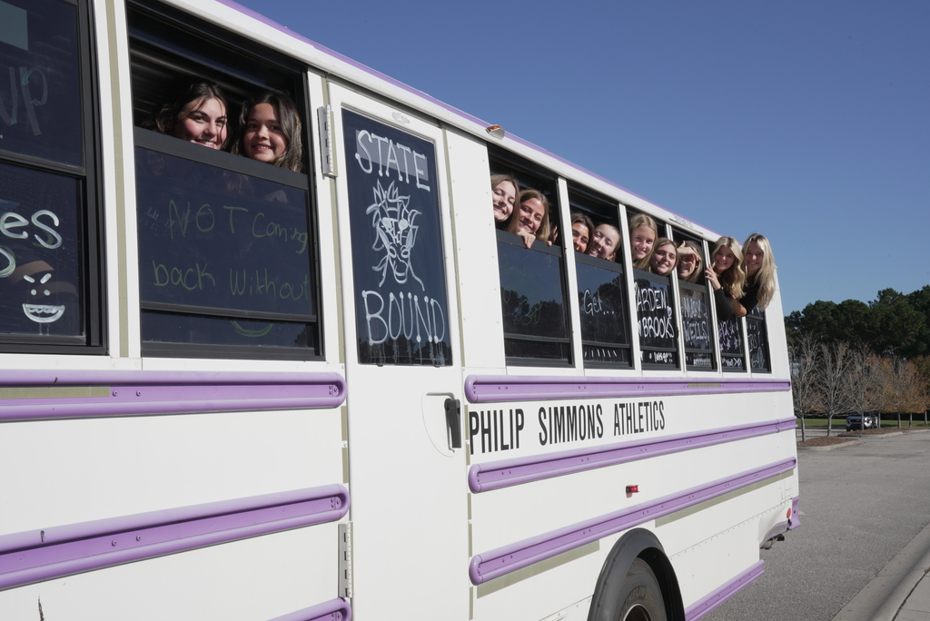 Girls volleyball team on the bus to state