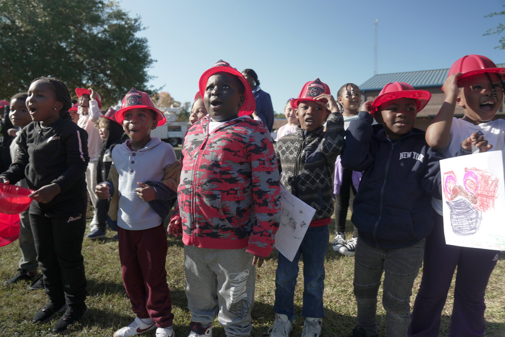CHE students in hats