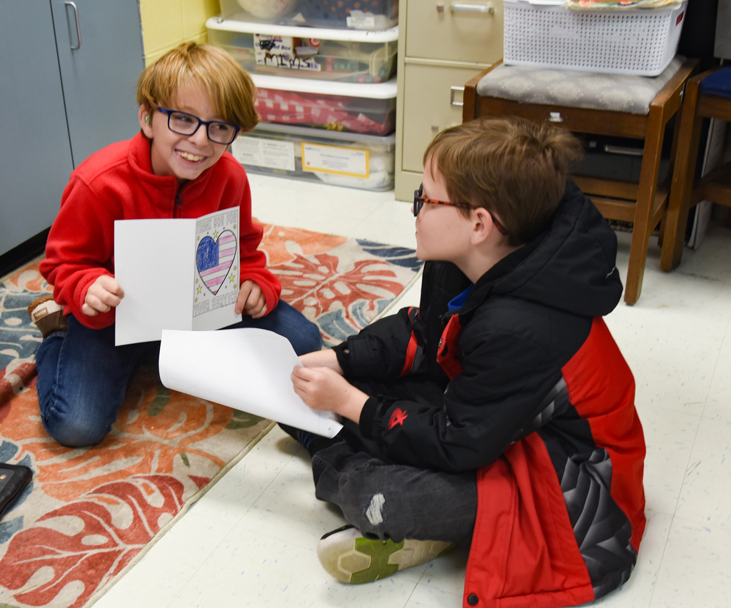 student sharing letters