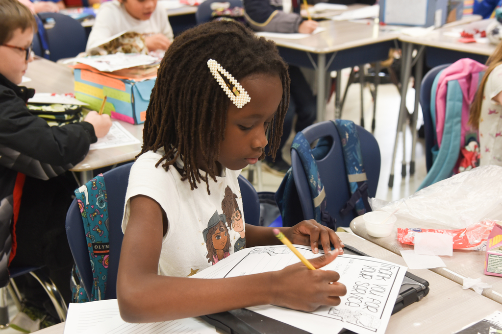 student writing letter