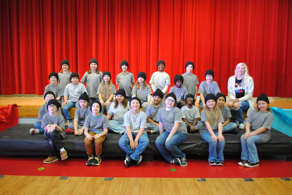 Ms. Lorenz's Class Photo- All students in gray shirts with black beanies