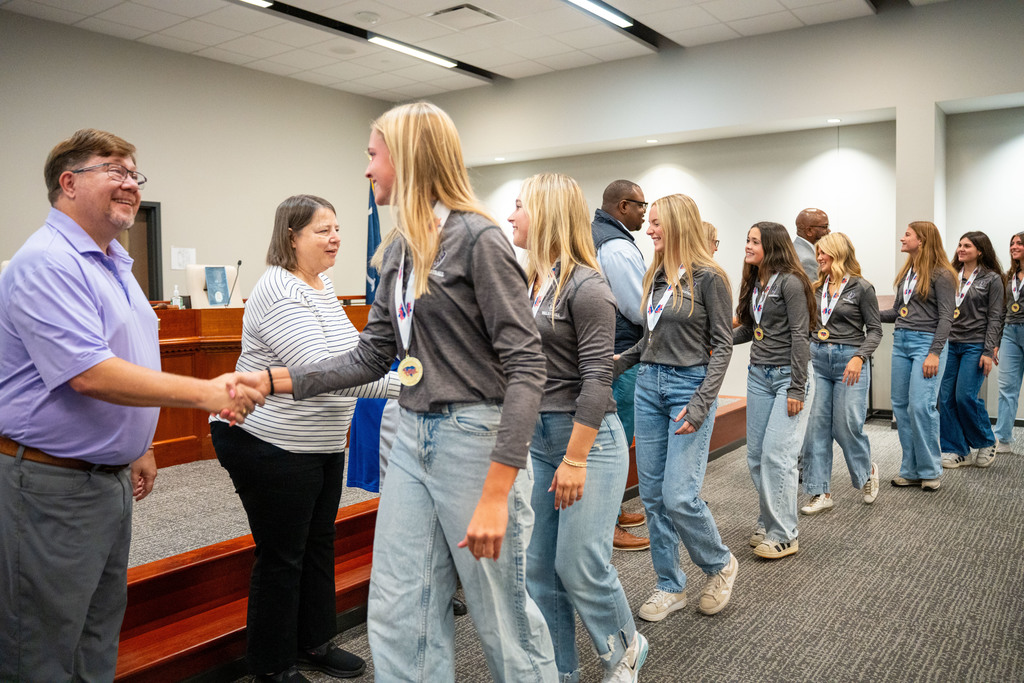 PSH girls volleyball team at the board meeting