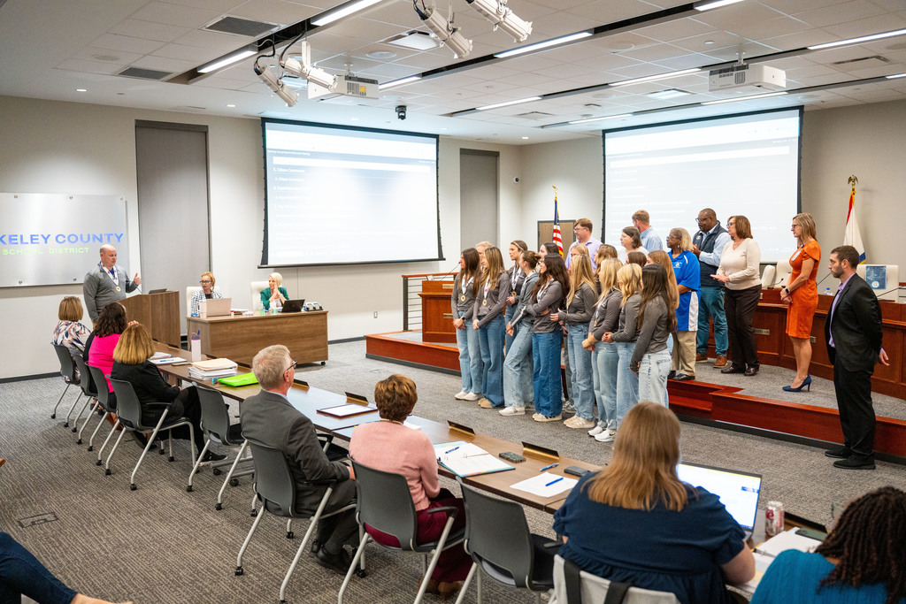 PSH girls volleyball team at the board meeting