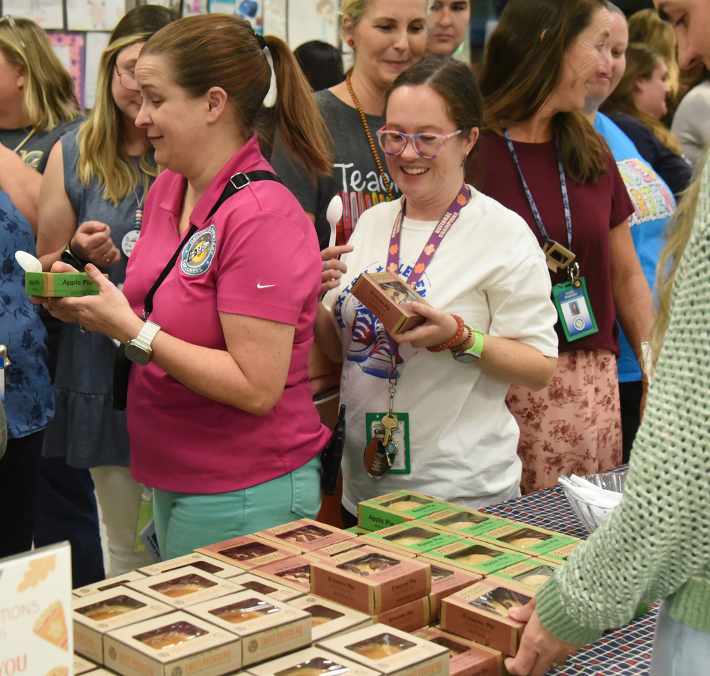 teacher picking up pie